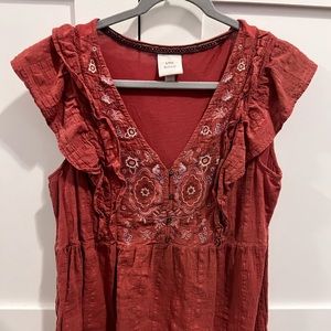 Red flowy blouse